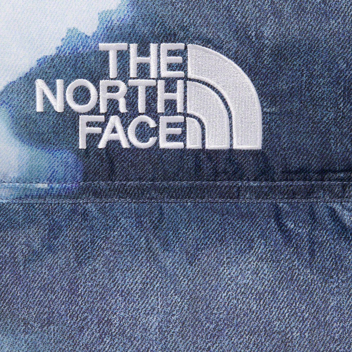 Supreme®/The North Face® Bleached Denim Print Nuptse Jacket